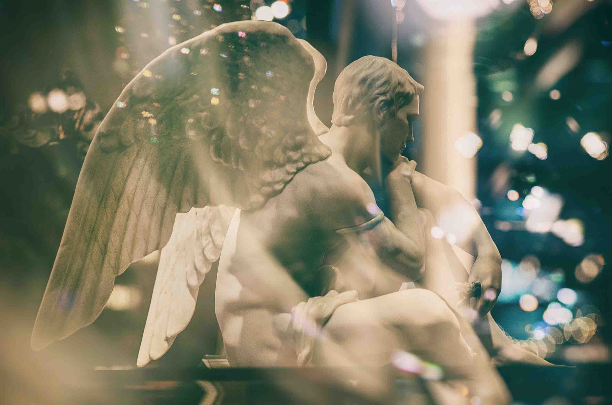 Photograph of a male angel statue